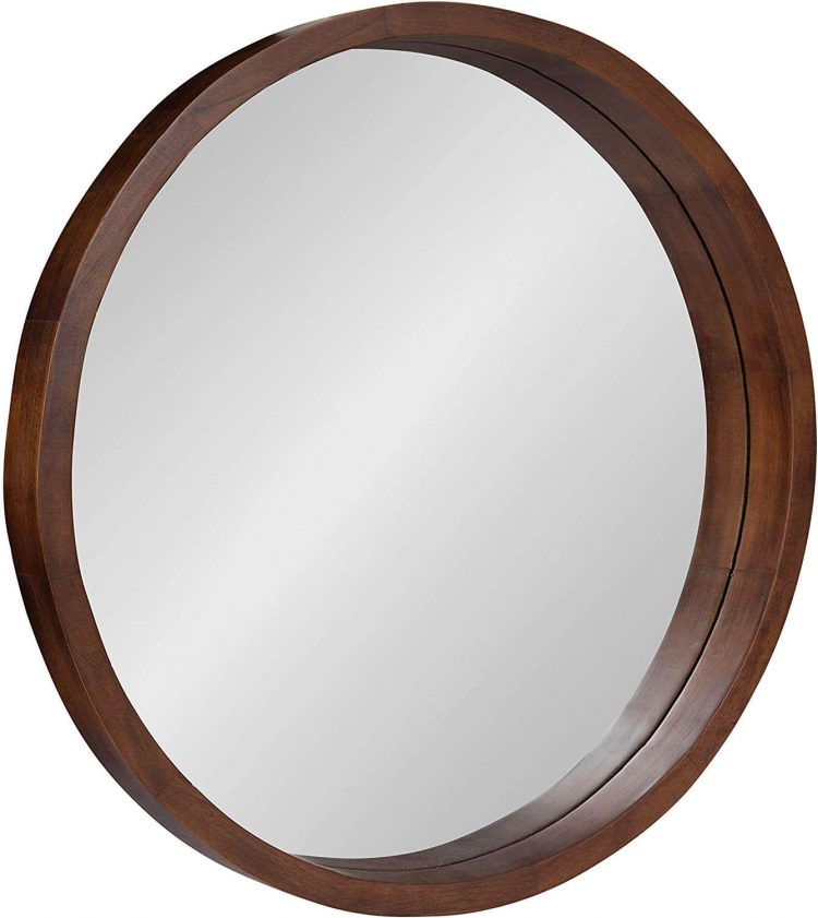 Mid century circle mirror with wood frame.