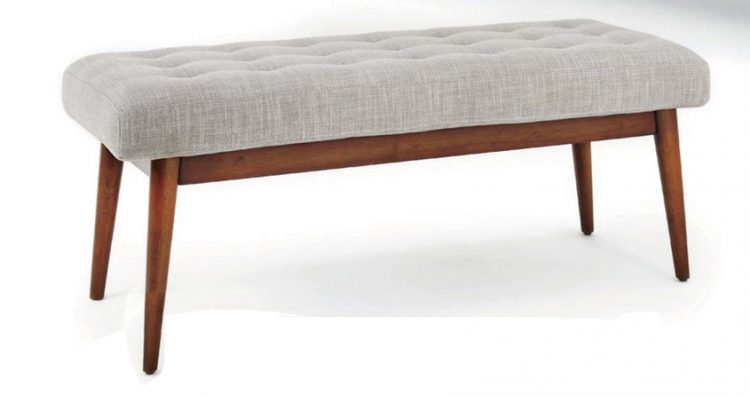 A mid century bench with a gray cushion and wooden-body frame.