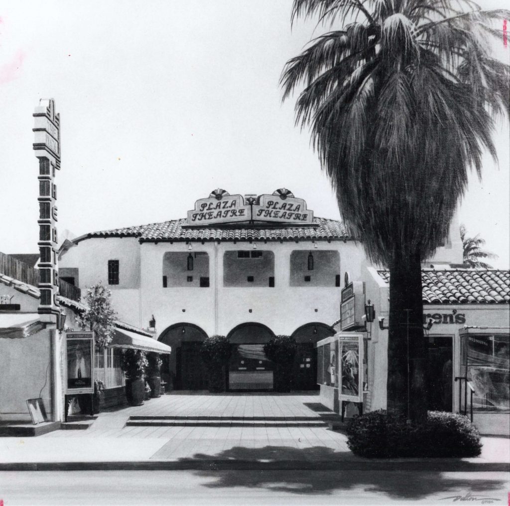The exterior of the Plaza Theatre with a large Palm Tree positioned starkly next to the building.