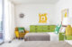 Colorful MCM guest room with lime green, yellow and gray accents