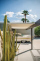classic car in carport of Krisel designed home in Palm Springs