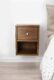 Small space nightstand that hangs on the wall with one open shelf and one drawer