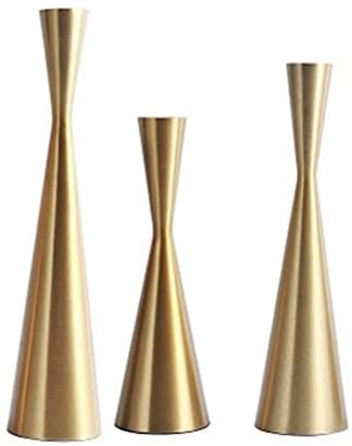 3 brass-finished tapered candle holders.