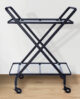 Retro style black bar cart with glass surfaces