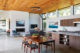 open concept kitchen and living room in rebuilt Eichler