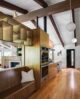 floating cabinets and built-in bench in Arkansas open concept kitchen dining room