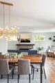 dining room with modern chandelier in renovated 1959 Denver ranch