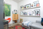 Studio room with framed prints in different colors and styles