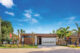 driveway front exterior of mid century style home in Florida