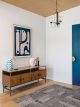 entryway with blue door in Project House Austin