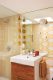 bathroom with geometric wallpaper in Palm Springs getaway home