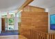 foyer with wood column in renovated Maryland mid century home