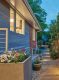 white cedar siding and bluestone pavers in Maryland mid century home