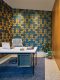 home office with blue and gold tiled wallpaper