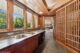 Enwilde kitchen with wood screen