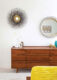 MCM dresser and sunburst wall decor