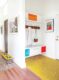 yellow tile in entryway with bright cubby holes in Michigan home