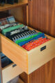 an open drawer filled with aprons