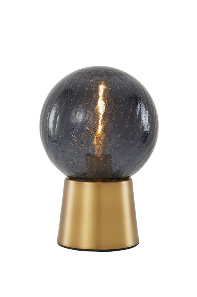 a light inside of a smoke glass orb