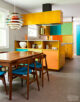 classic mid century modern kitchen with colorful cabinets