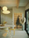 glass privacy blocks and Nelson bubble lamps in renovated MCM home