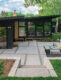 geometric lines of patio continue the modern style of home