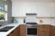 white tile gray grout gray tile white grout in renovated kitchen