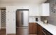 mid century room divider neutral backsplash tile in mid century kitchen