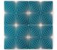 geometric starburst design on peacock blue ceramic tile