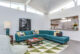 teal sectional sofa and clerestory windows in Palm Springs living room