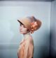 Audrey Hepburn in peach costume to promote 1964 My Fair Lady film