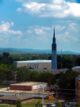 distant view of First Baptist Church in Huntington