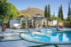 fountain and pool in backyard of renovated Eichler home