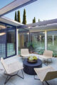 conversation area in outdoor atrium of renovated Eichler home