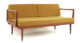 teak sofa with mustard upholstery