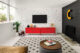 playroom with colorful polka dots and neutral rug