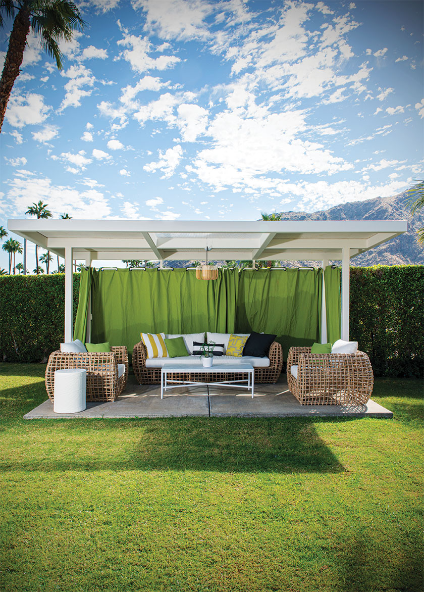 covered pergola with outdoor sectional sofas