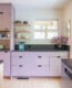 kitchen with lavendar colored cabinets.