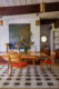 a heywood Wakefield dining set in a mid century modern house