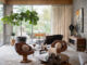 a chicago modernism living room with vintage mid century modern chairs and furniture