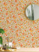 a bright and cheerful floral pattern in warm shades of orange and yellow