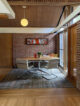 wood and brick walls inside a mid century modern home in chicago