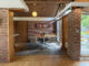 wood and brick walls inside a mid century modern home in chicago