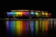 Kennedy Center lit up with colorful lights at night